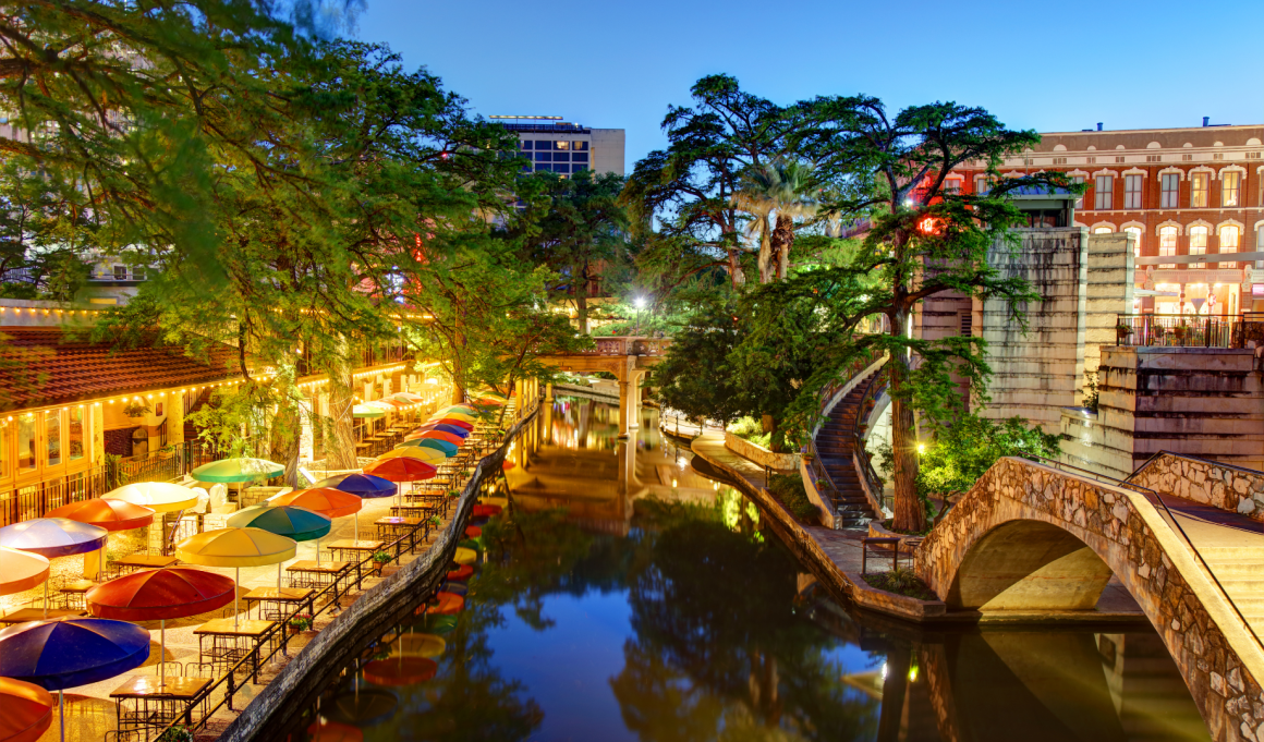 A river with many tables and chairs on it